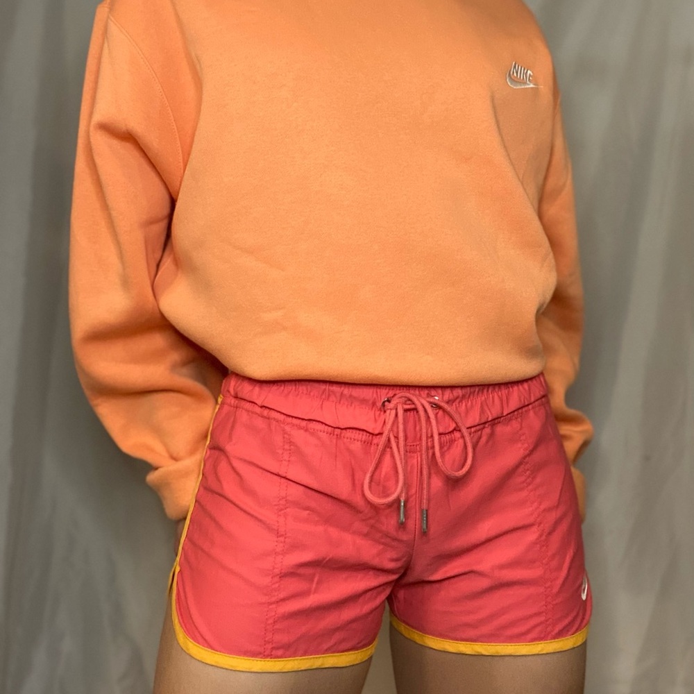 Pink Nike shorts
